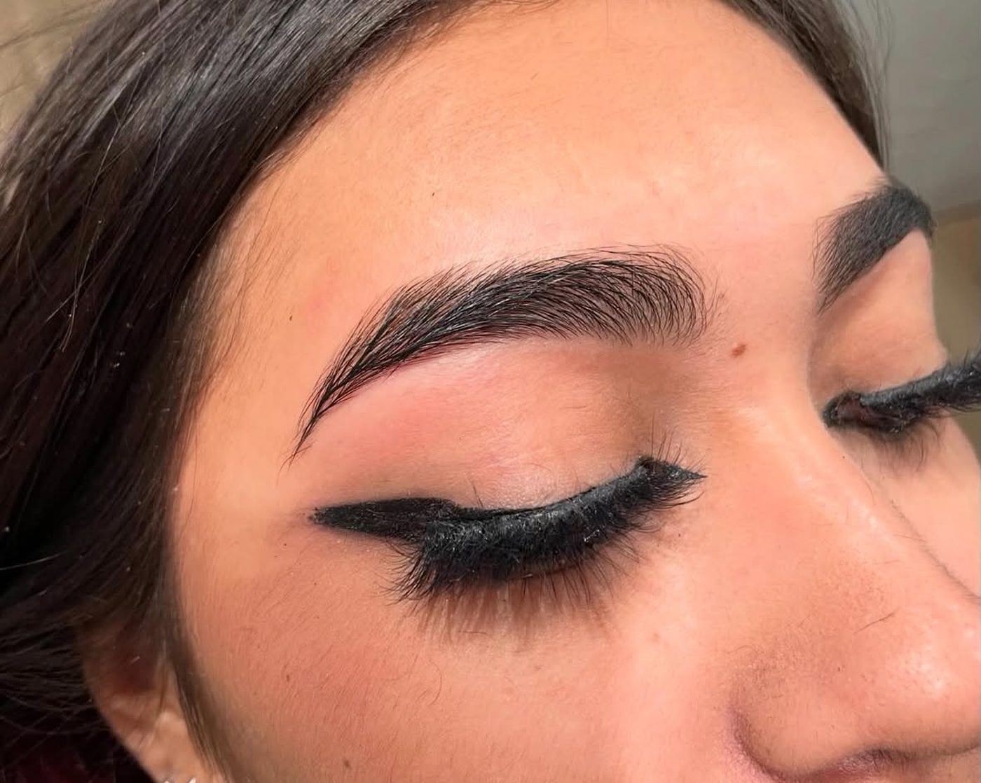 Perfectly shaped eyebrow after Bliss Brow Threading service